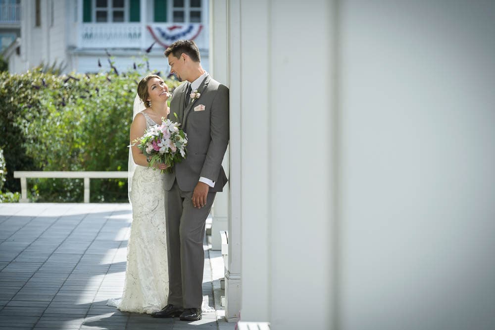 Bride and groom posing outside Congress Hall wedding venue