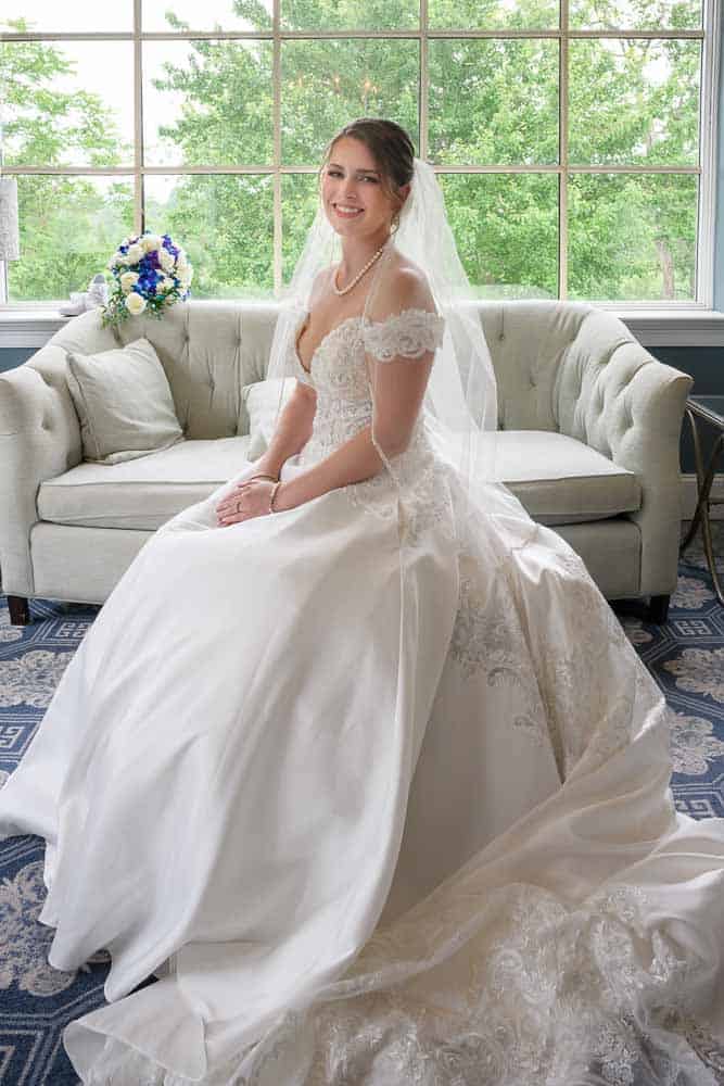 Bride seated for a portrait at Bradford Estate Hainsport NJ.