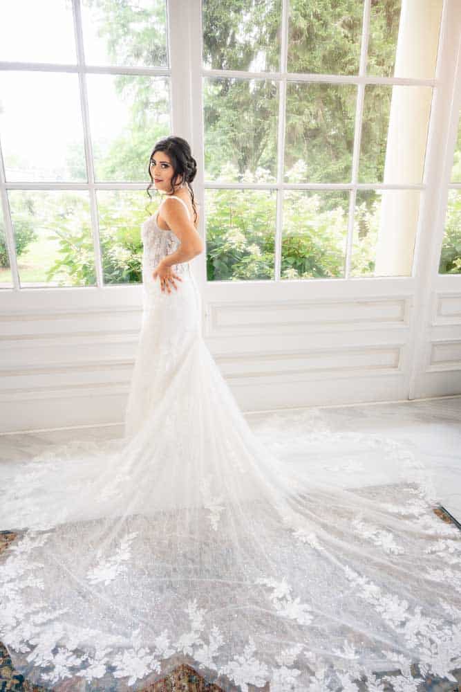 Full length portrait of the bride in the Atrium Closeup at the Collingswood Grand Ballroom Wedding.