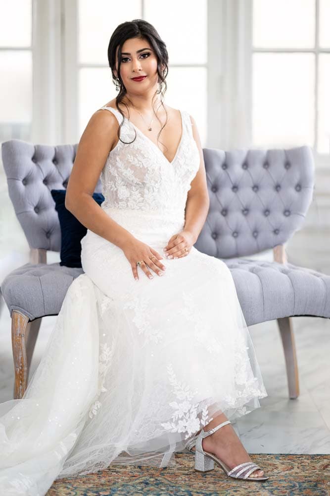 Full length seated portrait of the bride at the Collingswood Grand Ballroom Wedding.