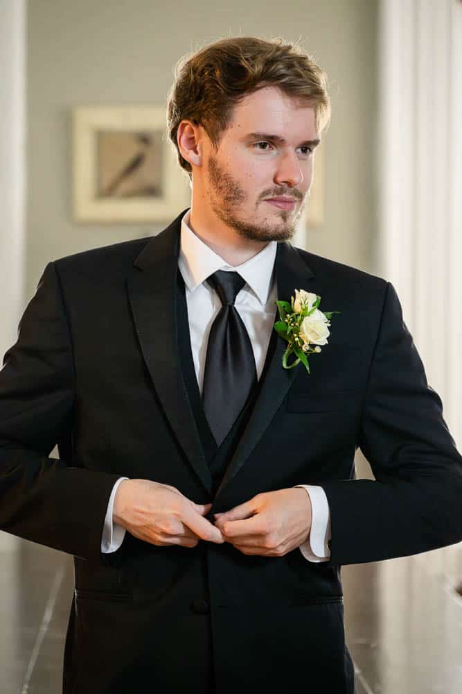 Groom final preparation at the Collingswood Grand Ballroom Wedding.