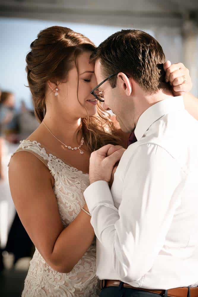 bride and groom have their first dance at the beginning of the reception at the ICONA Diamond Beach wedding.