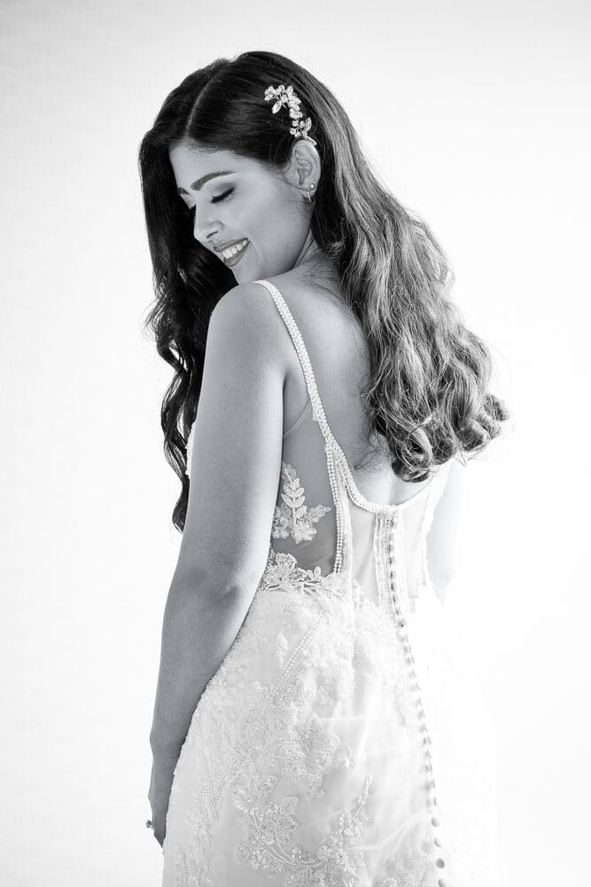 Beautiful black and white portrait of the bride in her wedding gown