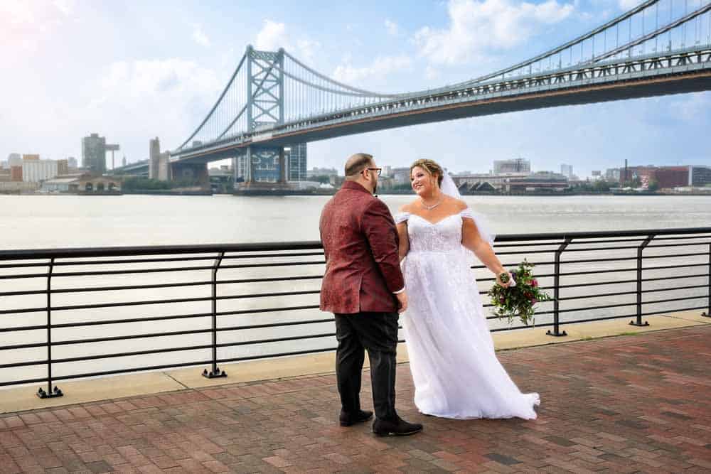 A first look for the bride and groom in front of the Adventure Aquarium in Camden NJ