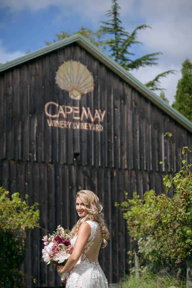 Bribe posing in fron the Cape May winery barn