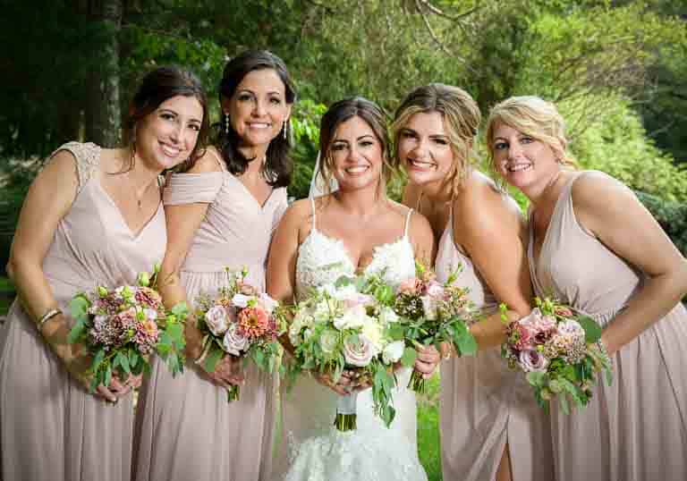 Bride and bridesmaids posing at Brigalias Sicklerville NJ