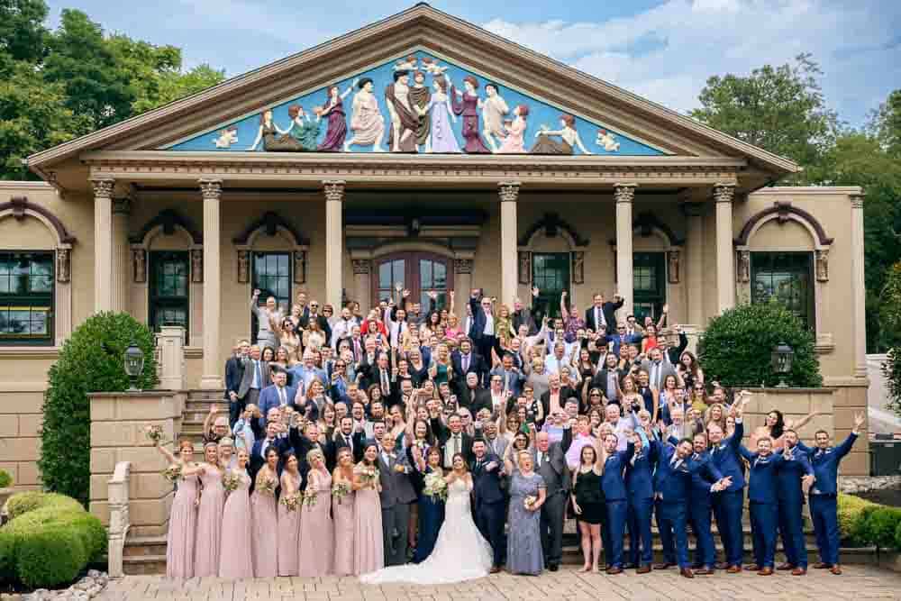 All wedding guest cheering the wedding of Michael and Laura in front of Brigalias Museum steps in Sicklerville NJ