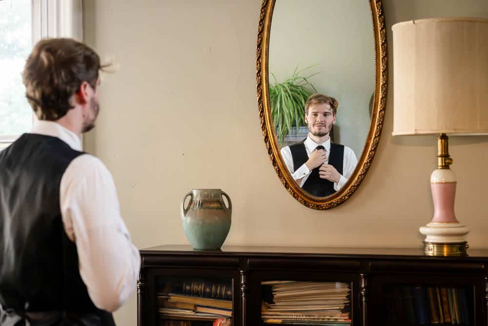 Grooms mirror reflection while get ready at the Collingswood Grand Ballroom Wedding.