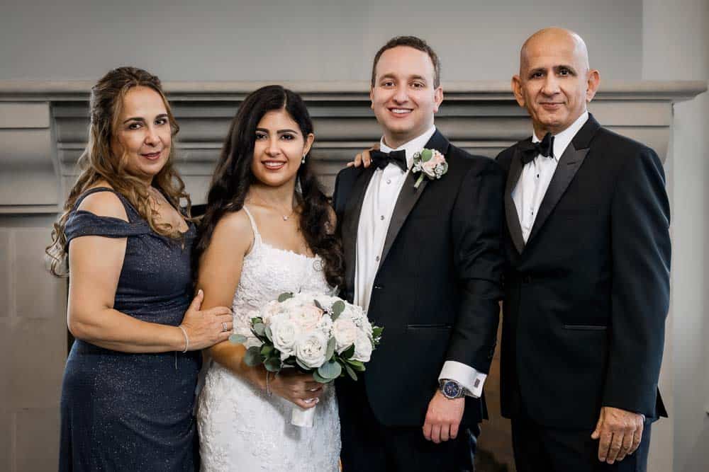 Bride and groom with the brides parents Legacy Club at Woodcrest in Cherry Hill NJ