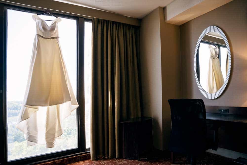 Bridal gown hanging in window at the Marian House in Cherry Hill NJ