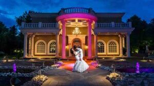 Beautifully lit Chapel at Brigalias as the groom dips his wife. Brigalias wedding photos.