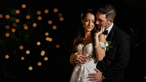 Bride and Groom romantic evening portrait outside Paris Caterers wedding venue.